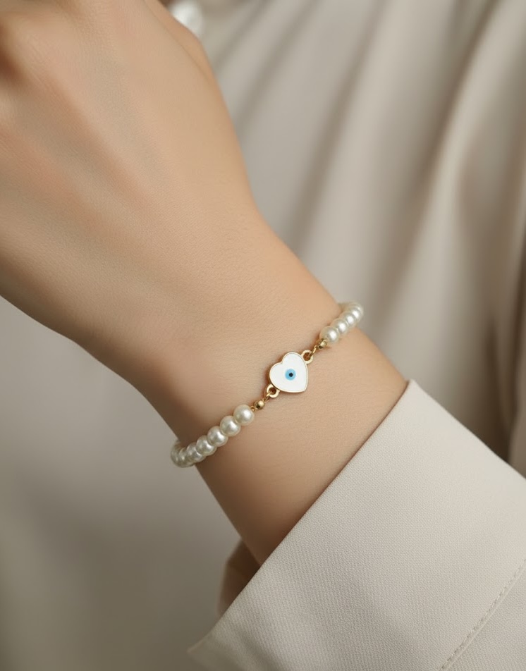 Pearl Bracelet with White Heart Evil Eye Charm